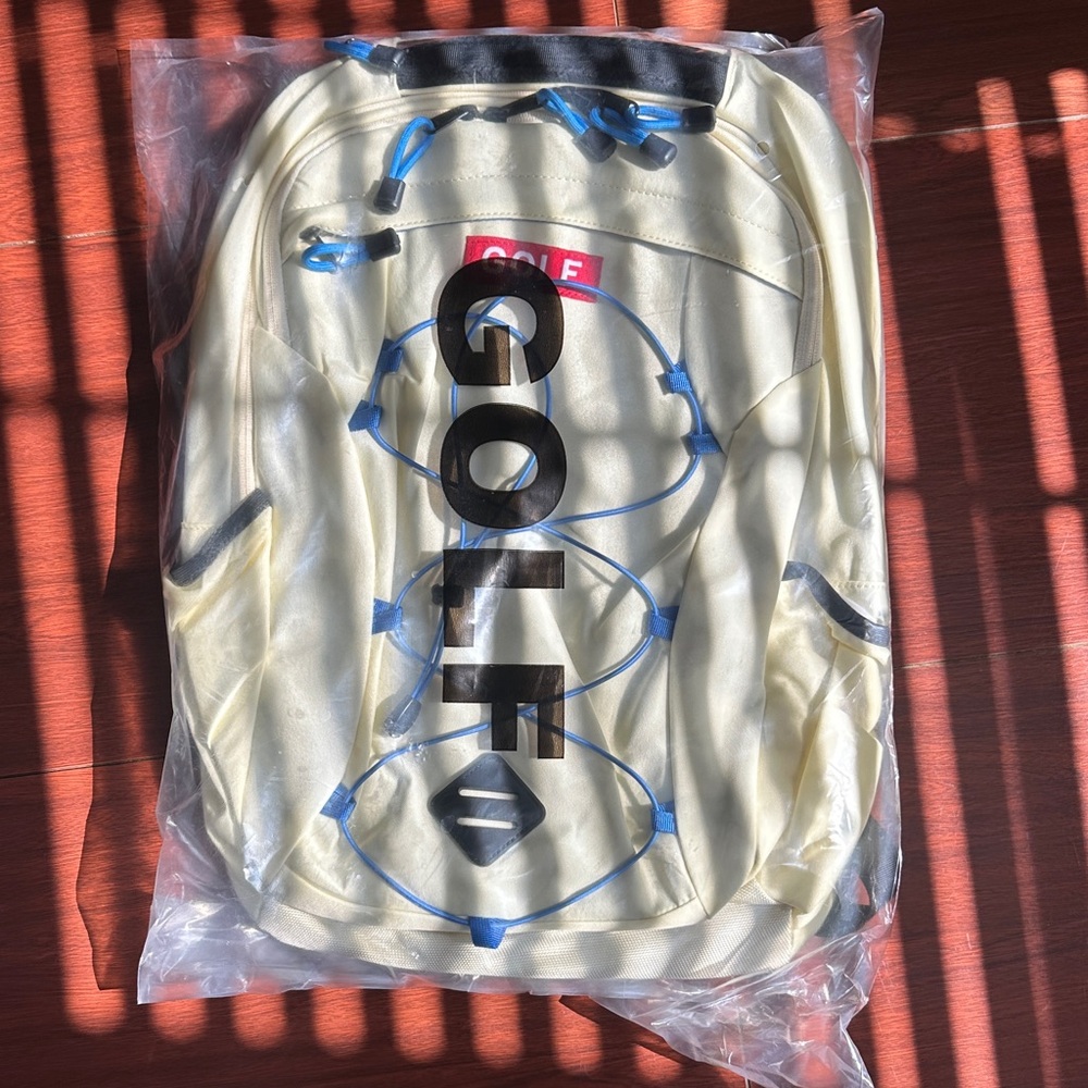 Cream and Blue Golf VIP 2023 backpacking